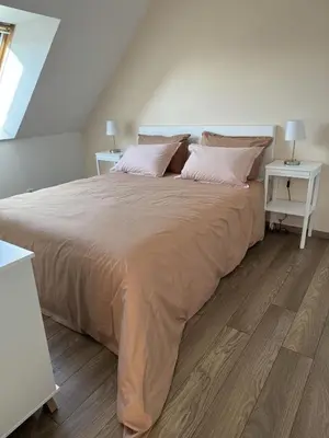 Un ou plusieurs lits dans un hébergement de l'établissement Maison Flair