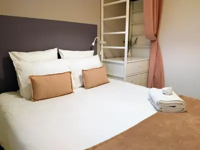 Un ou plusieurs lits dans un hébergement de l'établissement Ravissant Cottage avec jardin, refait à neuf, 2 à 5 pers