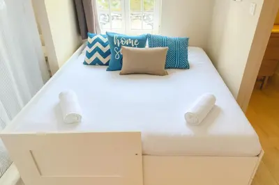 Un ou plusieurs lits dans un hébergement de l'établissement Appartement lumineux proche Abbaye & Centre de Caen
