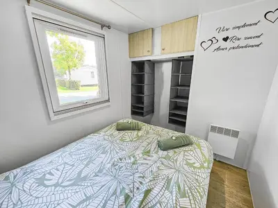 Un ou plusieurs lits dans un hébergement de l'établissement Mobile Home Eden