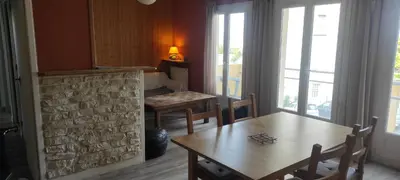 Coin salon dans l'établissement Logement entier 77 m2 Appart