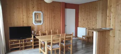 Télévision ou salle de divertissement dans l'établissement Logement entier 77 m2 Appart