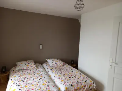 Un ou plusieurs lits dans un hébergement de l'établissement Maison proche plages OMAHA BEACH
