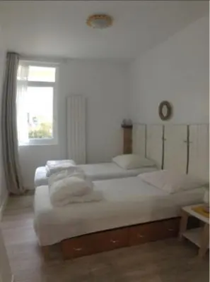Un ou plusieurs lits dans un hébergement de l'établissement Villa Chantereyne entrée de plage, 8 couchages