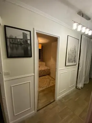 Un ou plusieurs lits dans un hébergement de l'établissement Bel appartement spacieux ,convivial de 3 chambres avec parking privé sécure
