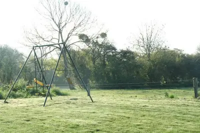 Aire de jeux pour enfants de l'établissement maison de campagne au bord de la mer