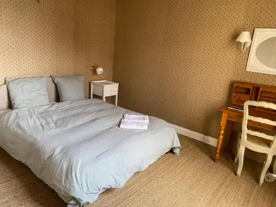 Un ou plusieurs lits dans un hébergement de l'établissement Le Petit Shamrock - villa sur la plage