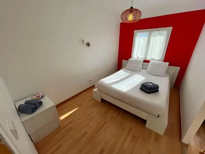 Un ou plusieurs lits dans un hébergement de l'établissement Le Maxaudant Duplex avec Balcon et Vue sur Mer