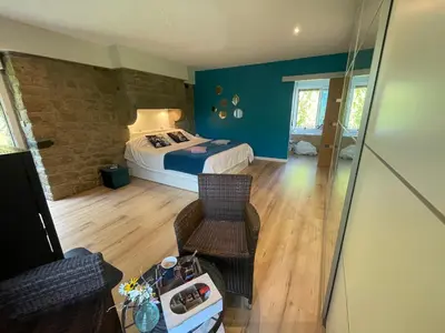 Un ou plusieurs lits dans un hébergement de l'établissement Chambre d hôtes le 23