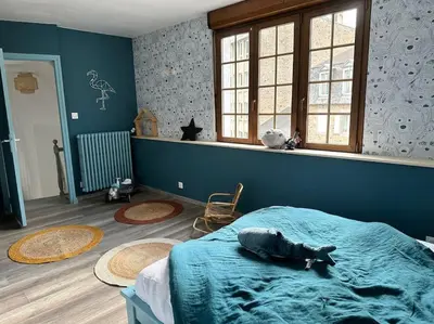 Un ou plusieurs lits dans un hébergement de l'établissement Petite maison de ville