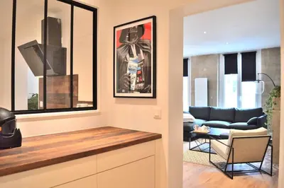 Coin salon dans l'établissement Hyper Centre - Élégant Appartement au Pied des Restaurants et Boutiques