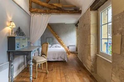 Un ou plusieurs lits dans un hébergement de l'établissement Normandie ferme restaurée du 18ème avec jacuzzi