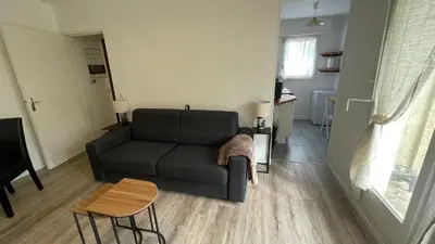 Coin salon dans l'établissement Studio avec jardin centre ville Cabourg La Roseraie