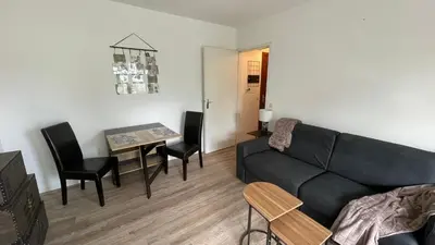 Coin salon dans l'établissement Studio avec jardin centre ville Cabourg La Roseraie