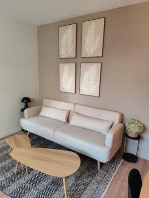 Coin salon dans l'établissement Appartement plein sud