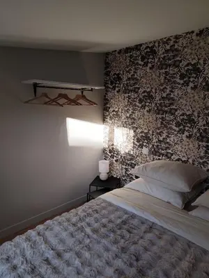 Un ou plusieurs lits dans un hébergement de l'établissement Appartement plein sud