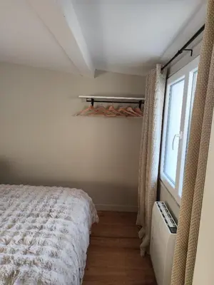 Un ou plusieurs lits dans un hébergement de l'établissement Appartement plein sud