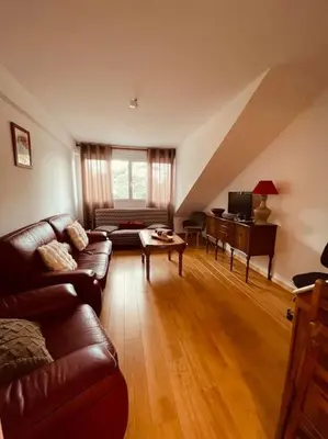 Coin salon dans l'établissement Appartement 200m de la plage
