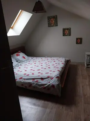Un ou plusieurs lits dans un hébergement de l'établissement Gite du souvenir