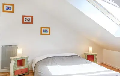 Un ou plusieurs lits dans un hébergement de l'établissement Amazing Apartment In Hauteville-Sur-Mer