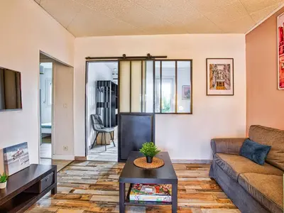 Coin salon dans l'établissement Maison de plain-pied avec jardin privé et terrasse à Cabourg - FR-1-788-40