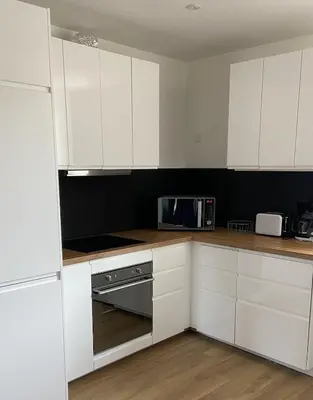 Cuisine ou kitchenette dans l'établissement Le Spot, appartement cosy à 1mn de la mer, Saint Aubin sur Mer