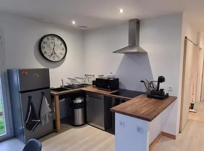 Cuisine ou kitchenette dans l'établissement Le Ponton de Magny-en-Bessin