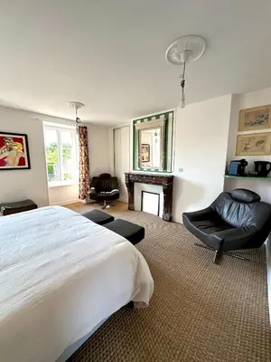 Un ou plusieurs lits dans un hébergement de l'établissement Chambre d'hôtes de charme Partager Enregistrer