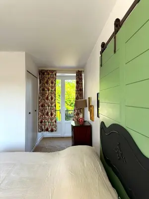 Un ou plusieurs lits dans un hébergement de l'établissement Chambre d'hôtes de charme Partager Enregistrer