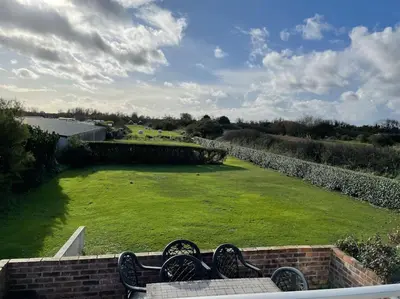 Jardin de l'établissement Maison vue sur mer