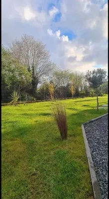 Jardin de l'établissement Charmante maison raffinée, conviviale & familiale
