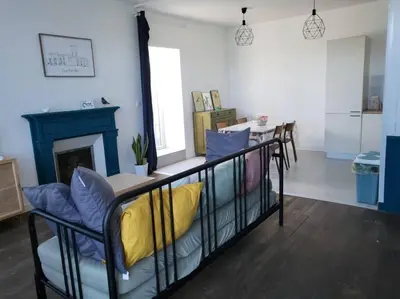 Coin salon dans l'établissement Charmante maison