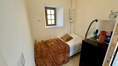 Un ou plusieurs lits dans un hébergement de l'établissement La Clef Decamp Chouette & Hibou 30 pers 2 gîtes jacuzzi, billard