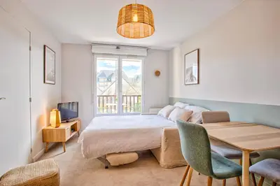 Un ou plusieurs lits dans un hébergement de l'établissement Appt cosy Cabourg 2 min plage 5 min thalasso