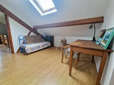 Un ou plusieurs lits dans un hébergement de l'établissement Lumineuse maison ancienne dans le centre Cabourg