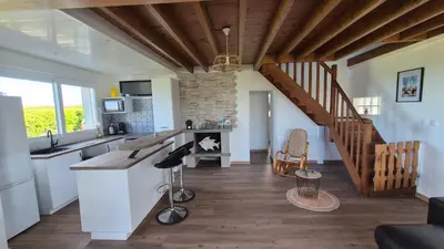 Coin salon dans l'établissement Les pieds dans l'eau - Cosqueville Vicq-mer