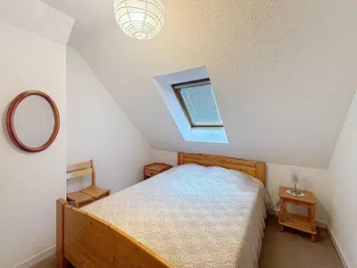 Un ou plusieurs lits dans un hébergement de l'établissement Appartement 2 pièces, 5 pers., parking, proche plage - FR-1-465-124