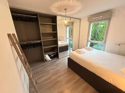 Un ou plusieurs lits dans un hébergement de l'établissement Appartement récent tout confort