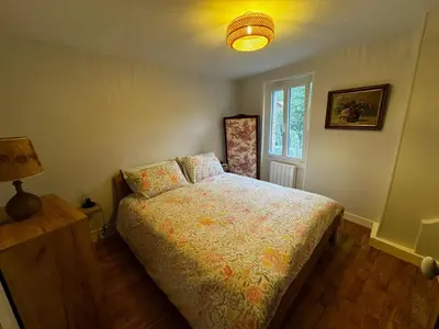 Un ou plusieurs lits dans un hébergement de l'établissement Petite maison Normande Calme Meublé Tourisme 2 étoiles