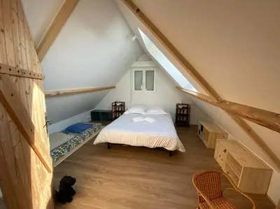 Un ou plusieurs lits dans un hébergement de l'établissement Villa Mirabelle - Proche plage