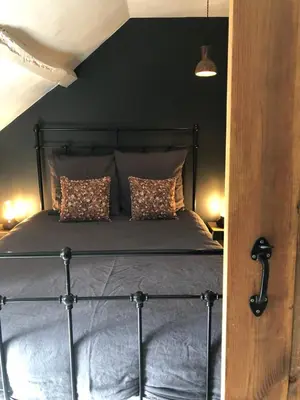Un ou plusieurs lits dans un hébergement de l'établissement La Chambrette La Canopée du Mont