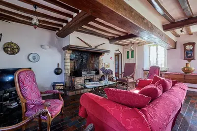 Coin salon dans l'établissement La Ferme de la Chapelle Saint-Roch - Maison de 190 m2