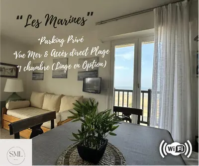Télévision ou salle de divertissement dans l'établissement Les Marines-Vue mer & plage Cabourg