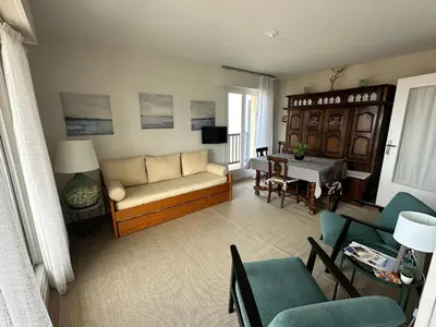 Coin salon dans l'établissement Les Marines-Vue mer & plage Cabourg