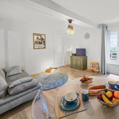 Coin salon dans l'établissement Le SweetHome