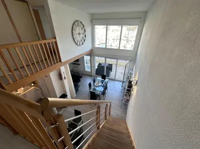 Coin salon dans l'établissement Les Lofts vue Port Guillaume