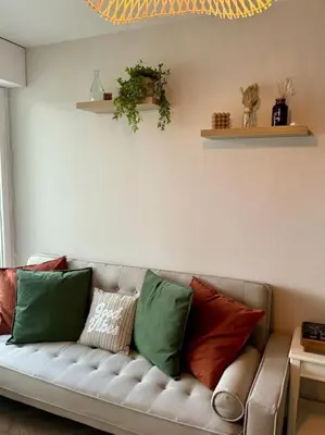 Coin salon dans l'établissement Appartement bohémien à Cabourg