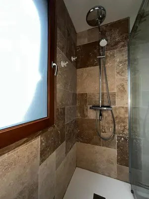 Salle de bains dans l'établissement Les Mimosas -Joli appartement tout confort