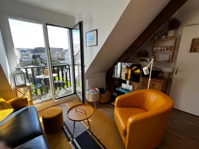 Coin salon dans l'établissement Les Mimosas -Joli appartement tout confort