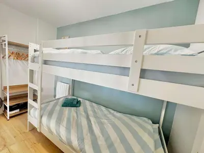 Un ou plusieurs lits dans un hébergement de l'établissement L'îleau, accès direct plage et jardin